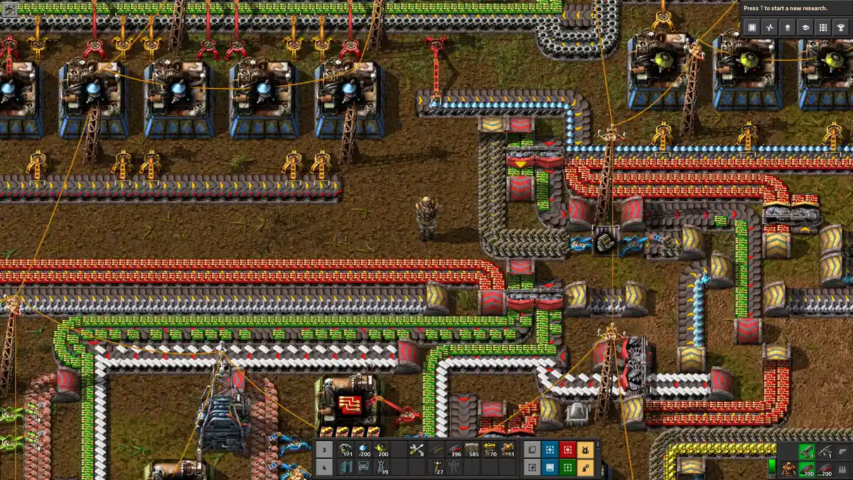 Captura oficial de Factorio con varias ramas de cintas hacia líneas compactas